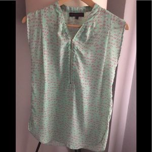 Sweet light green background, with tiny pink birds blouse